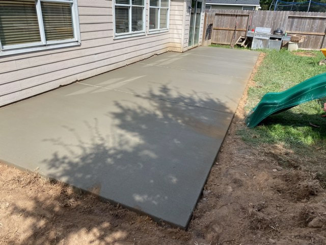 wide view of new concrete patio
